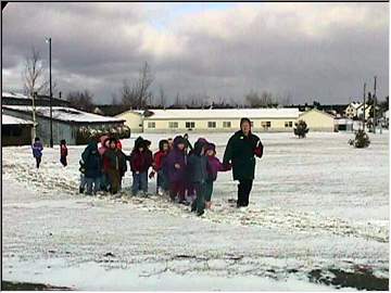 Carollers in the snow