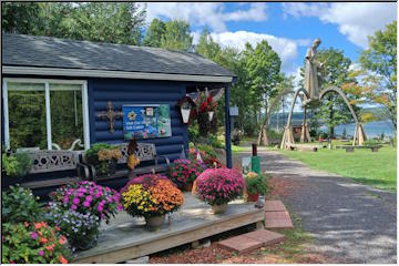 Beautiful flowers surround Bishop Baraga