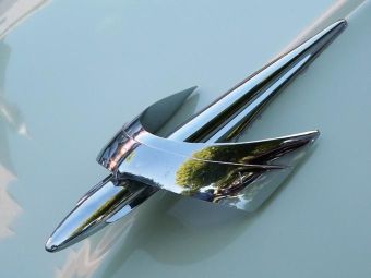 Merc hood ornament