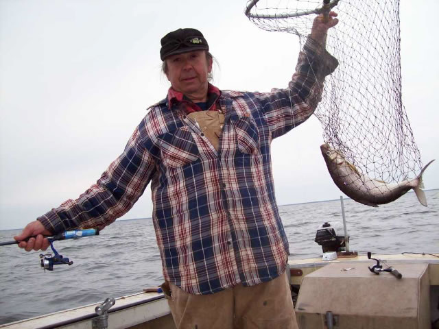 Willy with whitefish in net